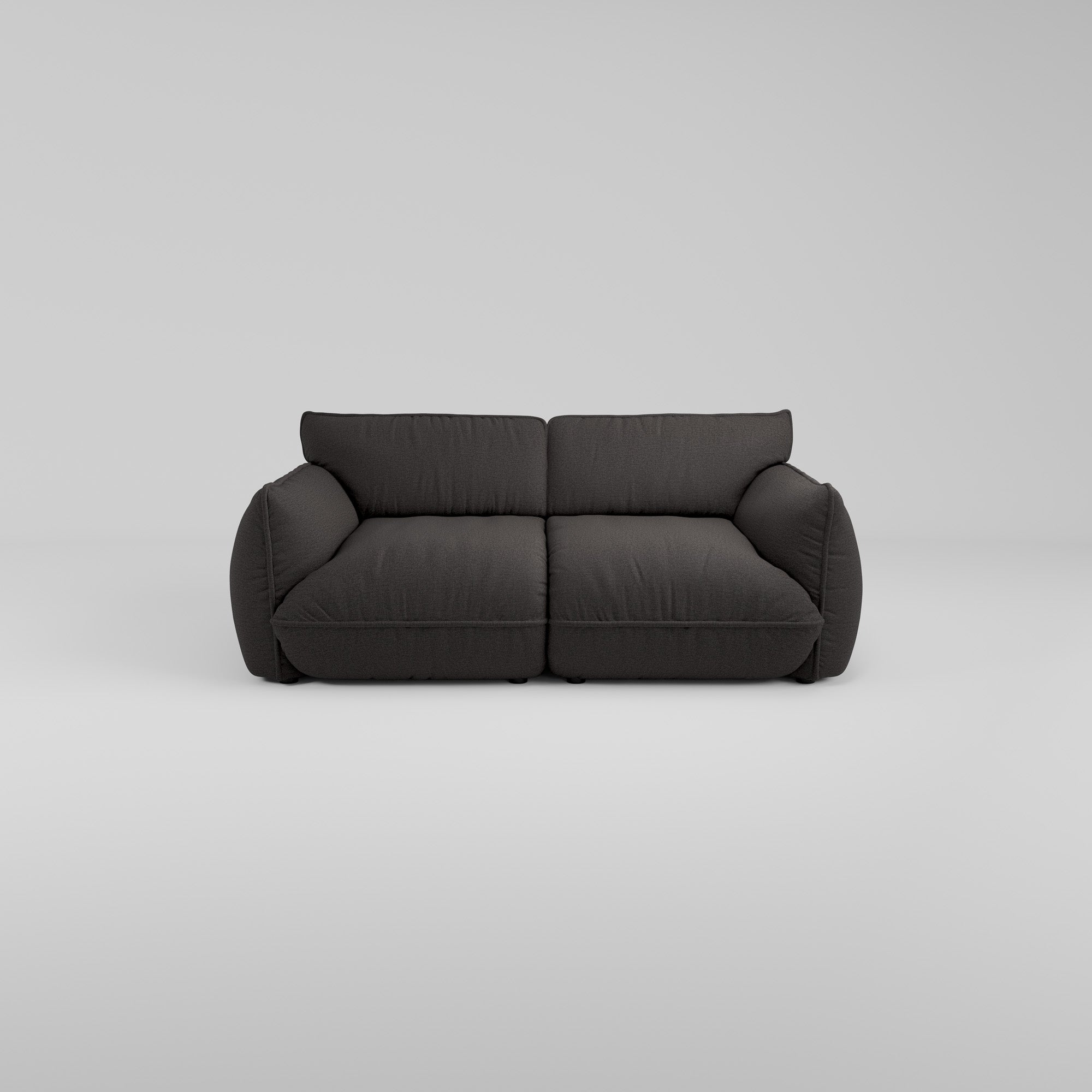 Das Morandi 2-Sitzer Sofa von Morandi hat eine skulpturale Silhouette, dunkelgrauen Plüsch und abgerundete Armlehnen.