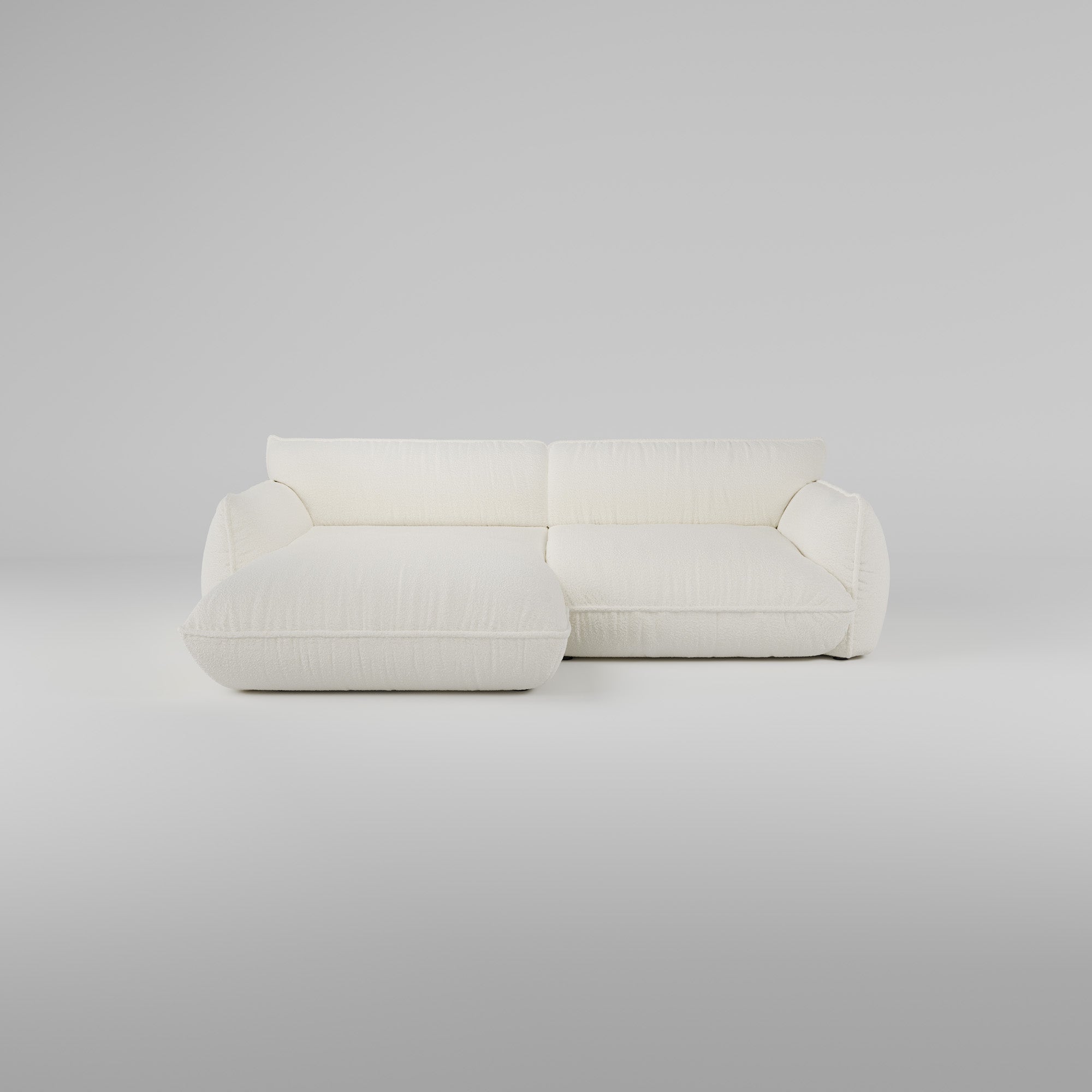 Das Morandi 3-Sitzer Ecksofa (Links) von Morandi zeichnet sich durch eine skulpturale Silhouette und eine Liege aus.