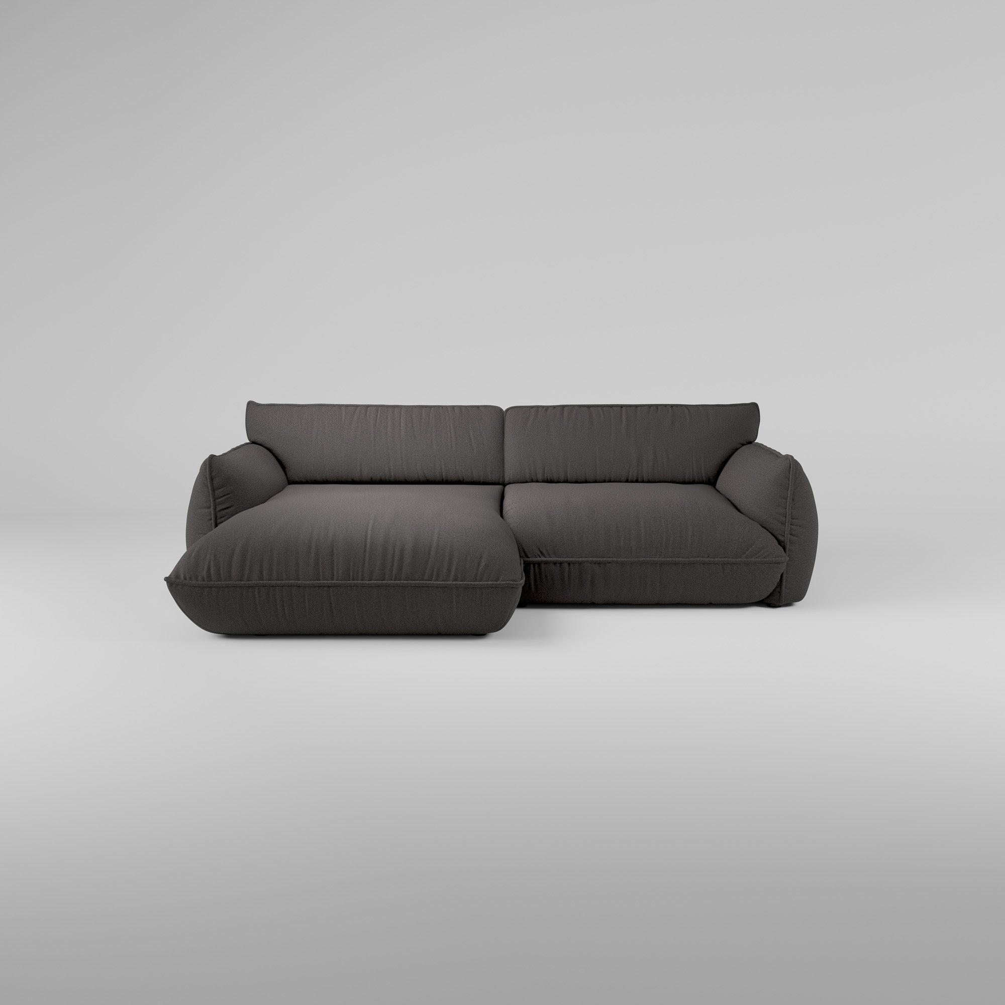 Dunkelgraues Morandi 3-Sitzer Ecksofa (Links) mit skulpturale Silhouette und Plüschkissen.