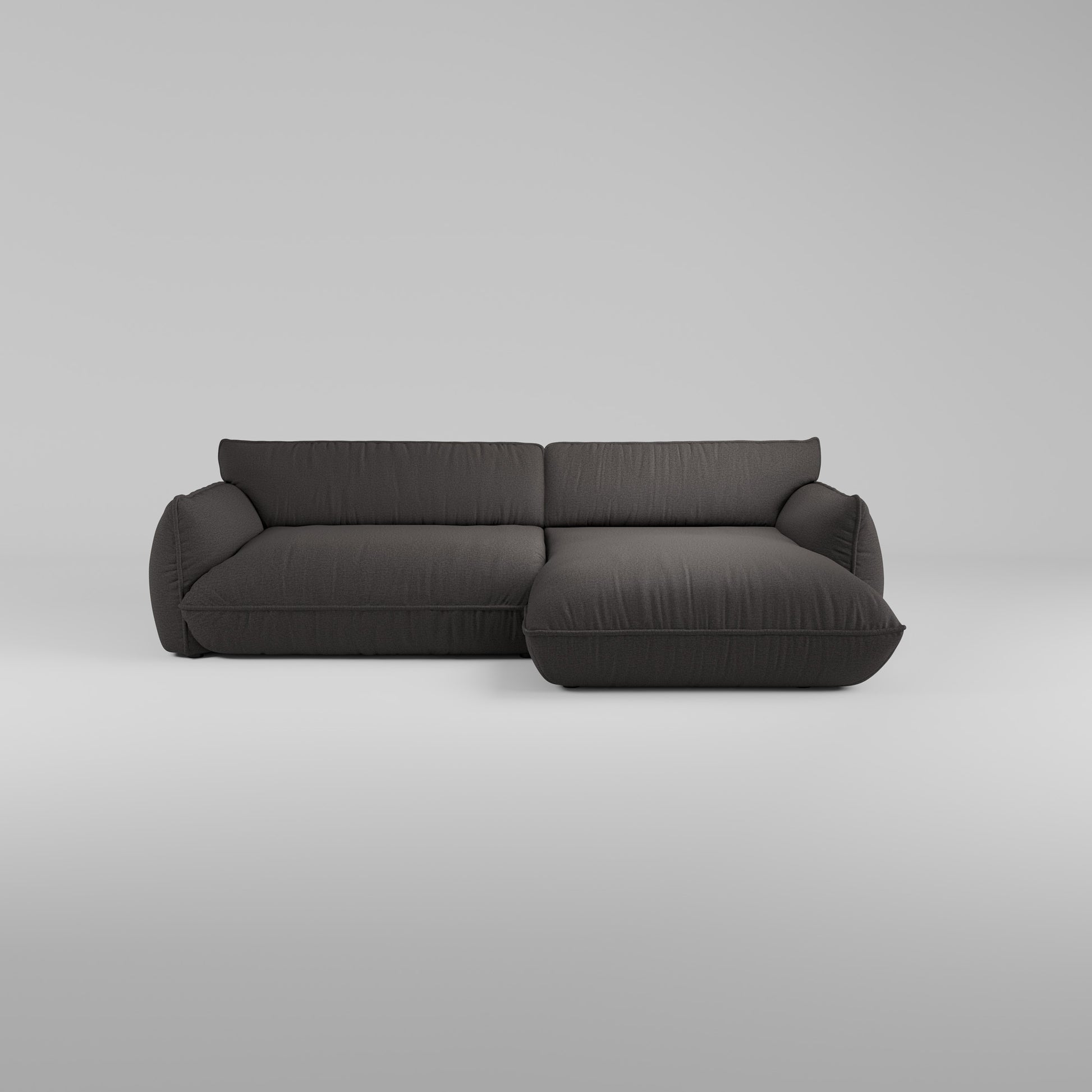 Morandi XL Ecksofa (Rechts) in dunkelgrau mit breiten Sitzflächen und verstellbaren Rückenlehnen, heller Hintergrund.